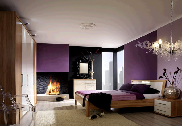 Un caminetto in stile moderno in una camera da letto con arredamento semplice e moderno